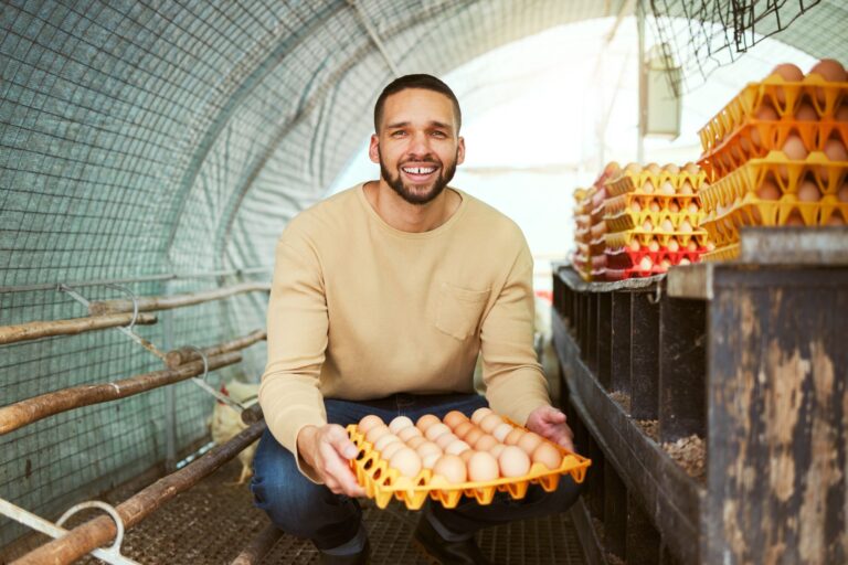 portrait-chicken-farmer-and-man-with-eggs-at-farm-2023-01-10-20-59-56-utc